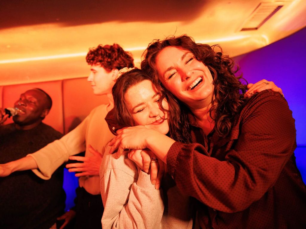 people enjoying karaoke lucky voice venue