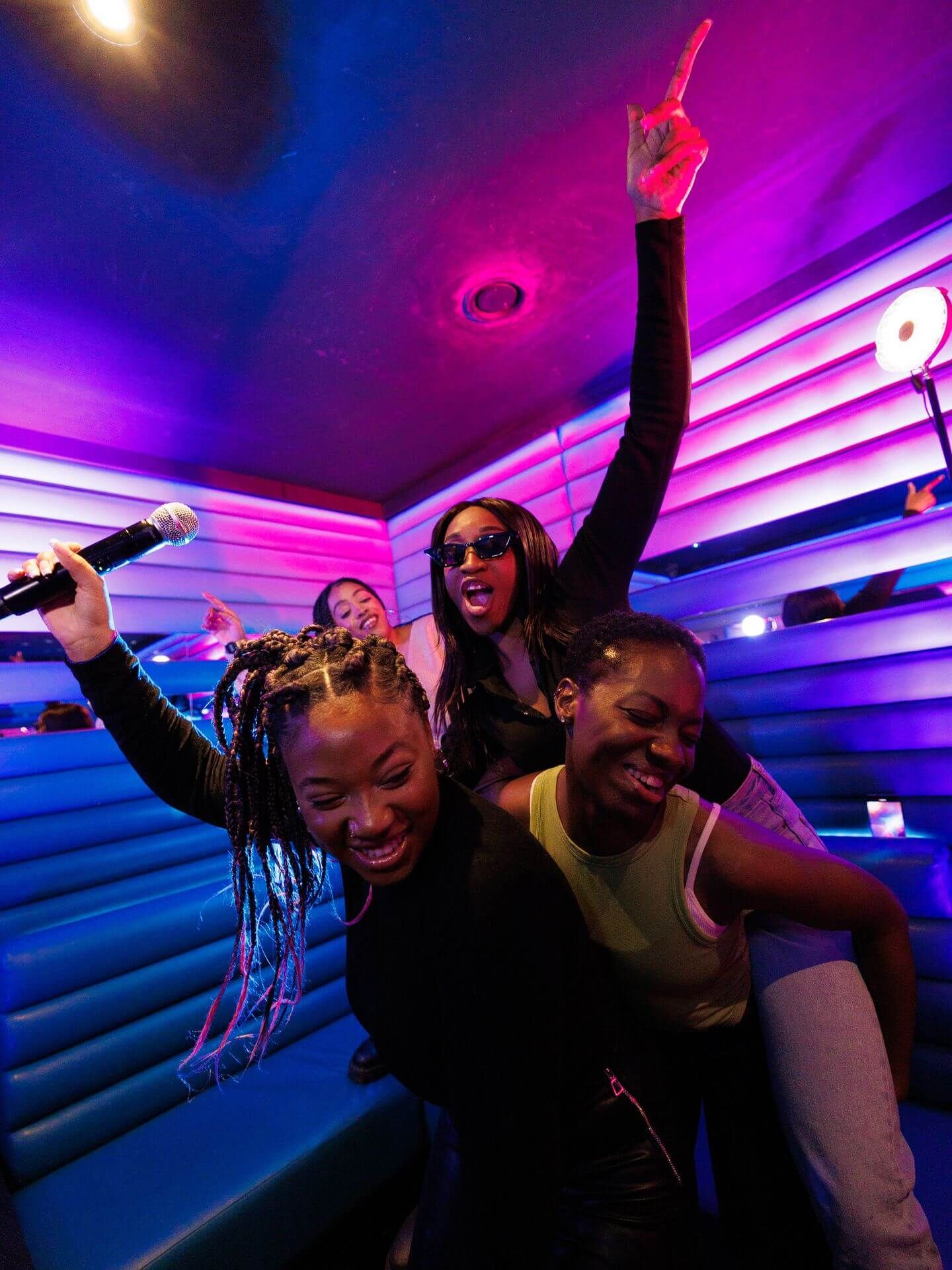 lucky voice karaoke room women having a party