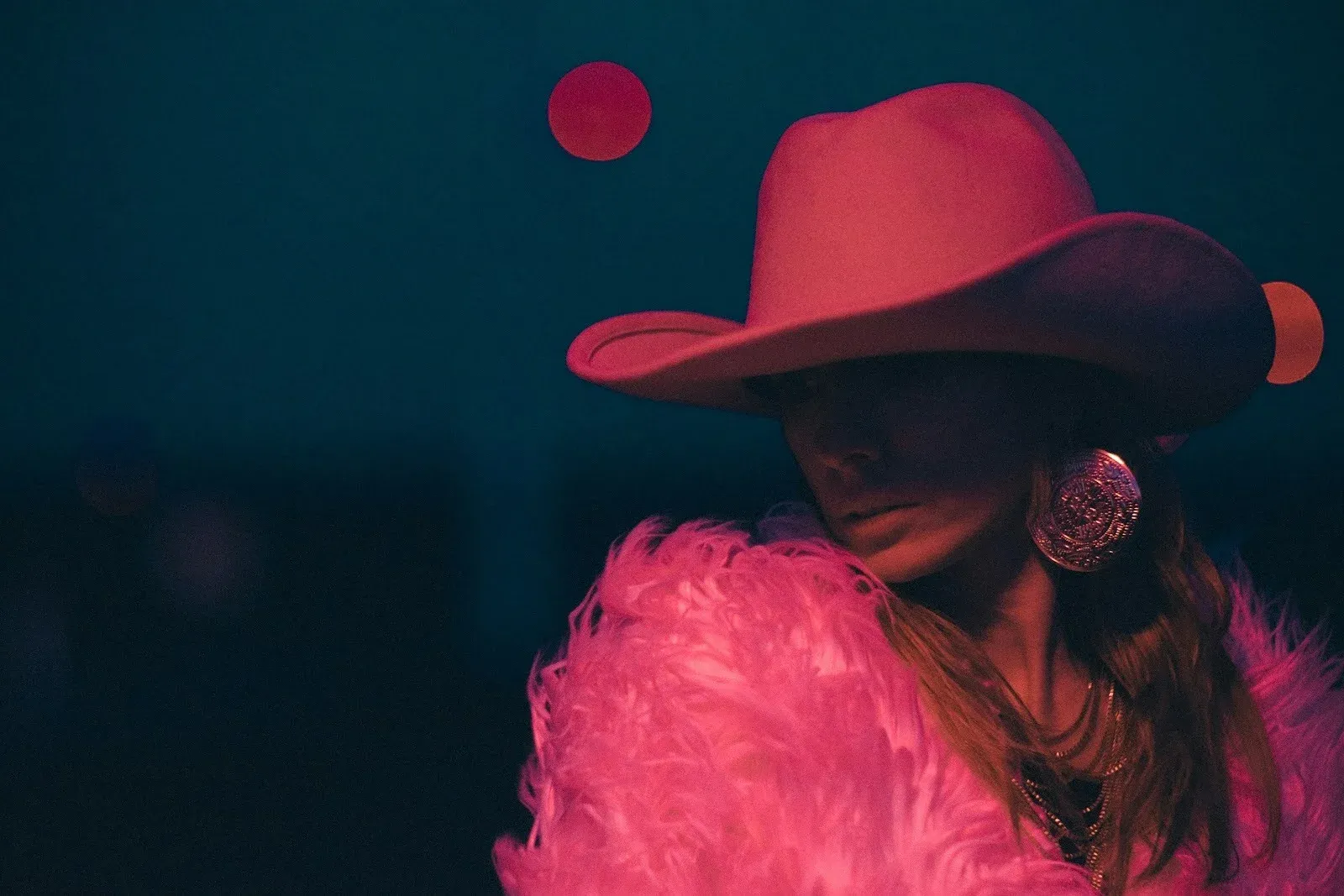 woman in pink cowboy outfit